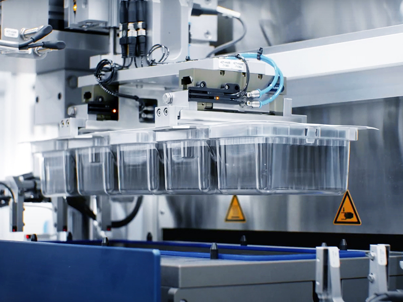 What are the main advantages of automated production lines?